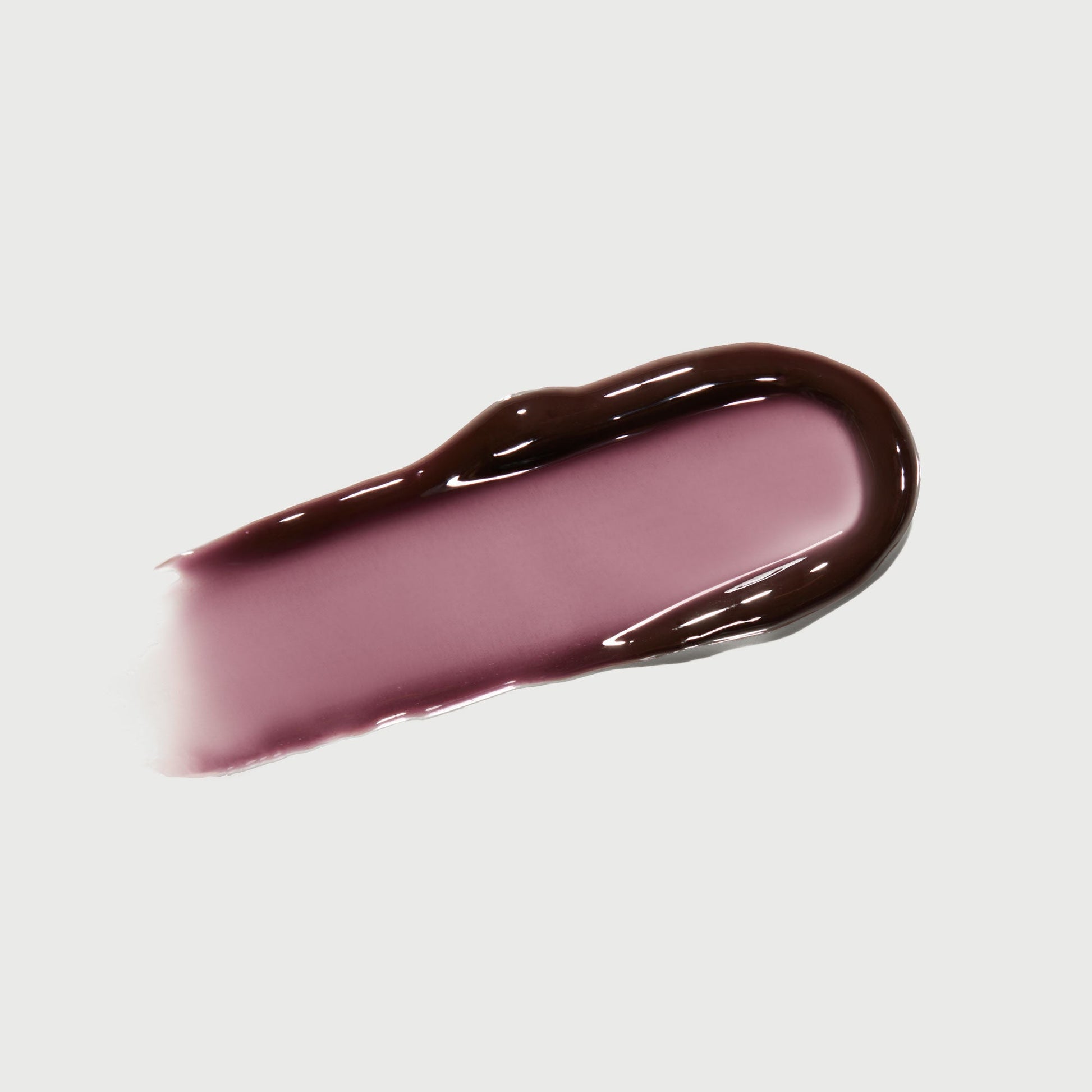 phyto-glow-lip-balm-midnight-a9 NATR-10118-Swatch-Phyto-Glow-Midnight-bonebkgd.jpg