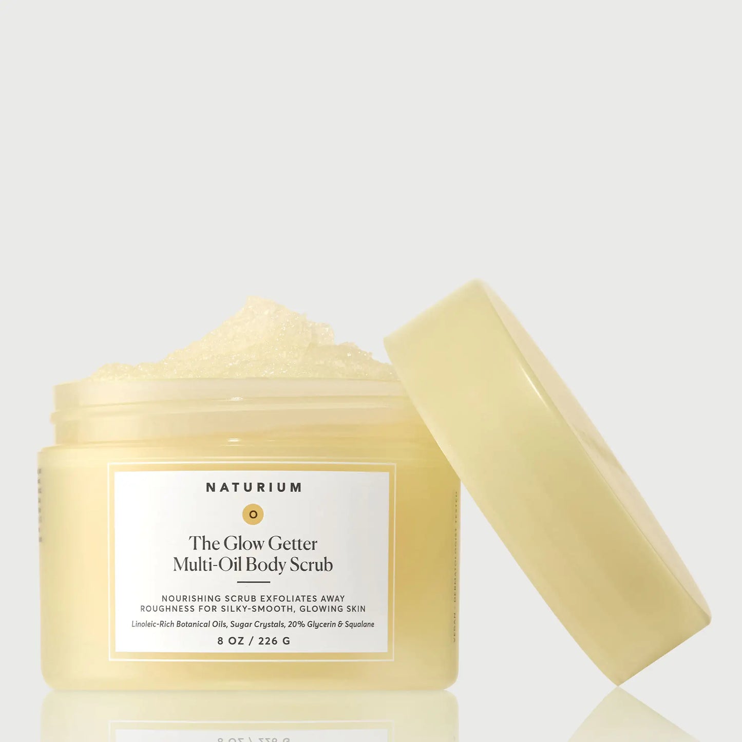 the-glow-getter-multi-oil-body-scrub-t0 NATR-40028-GlowGetter-Multi-Oil-Body-Scrub-Front-CapOff-bonebkgd.webp