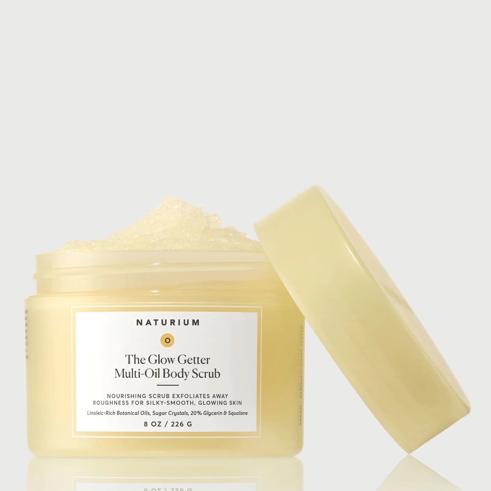 the-glow-getter-multi-oil-body-scrub-t0 NATR-40028-GlowGetter-Multi-Oil-Body-Scrub-Front-CapOff-bonebkgd.webp